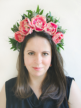 Teastyle wedding designer, Andreea, wearing a floral crown designed by her