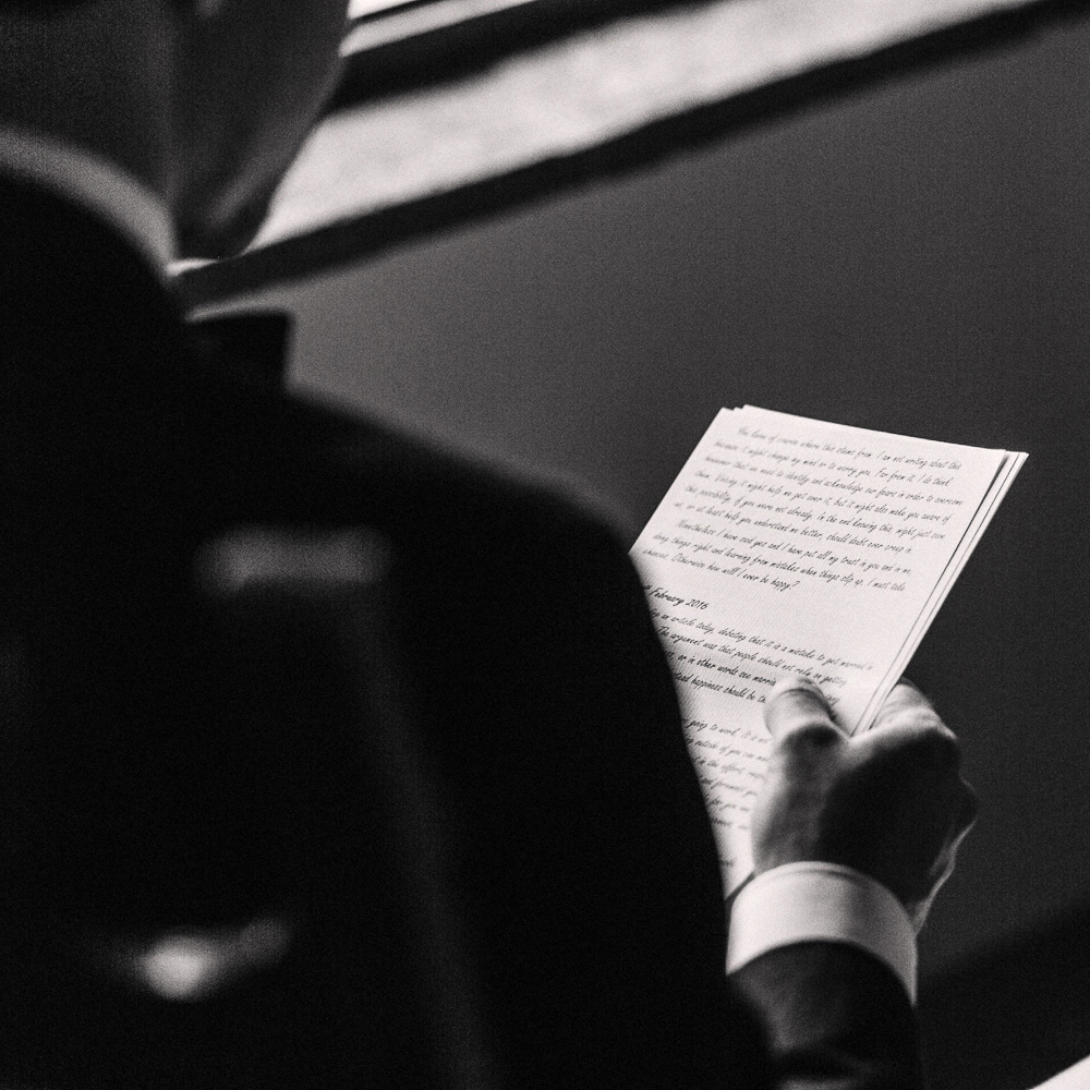 Groom reading a letter