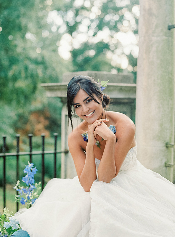 Bride smiling at a wedding for which Teastyle has performed wedding planning and design services